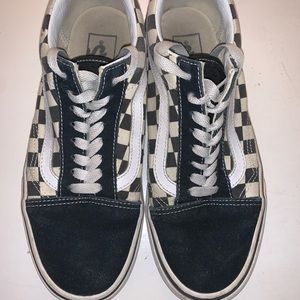 Black and white checkered low lace up vans
